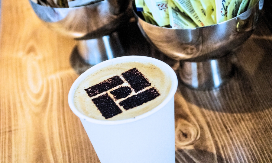 Private Advisor Group Logo placed in a Cup of Coffee